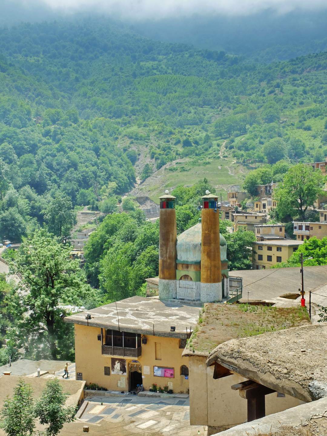 Travelers interacting with local guide in Iran